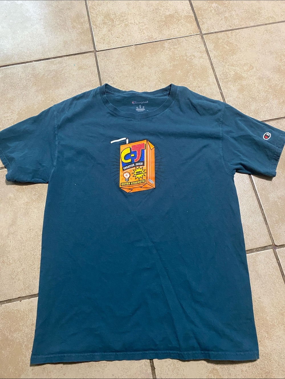 Champion Men’s Teal Short Sleeve Tee with Orange Juice Box Graphic